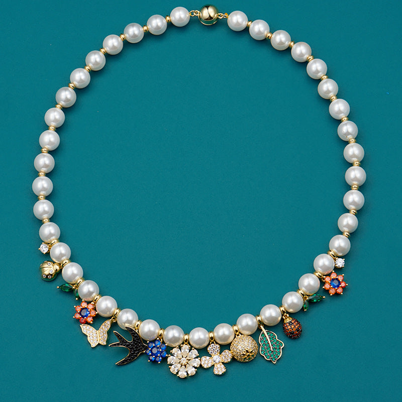 Fashionable retro style jewelry garden necklace women's jewelry flower pendant swallow beetle buckle pearl collarbone chain