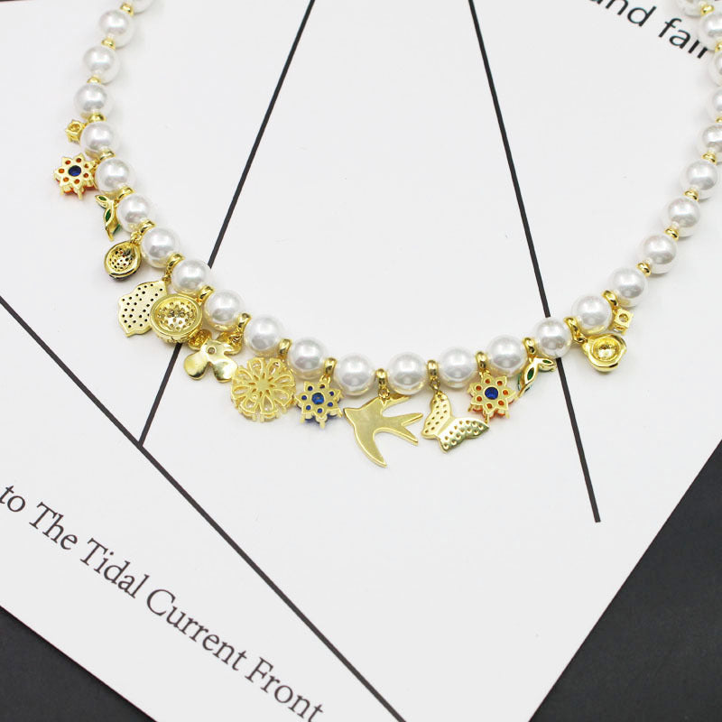 Fashionable retro style jewelry garden necklace women's jewelry flower pendant swallow beetle buckle pearl collarbone chain