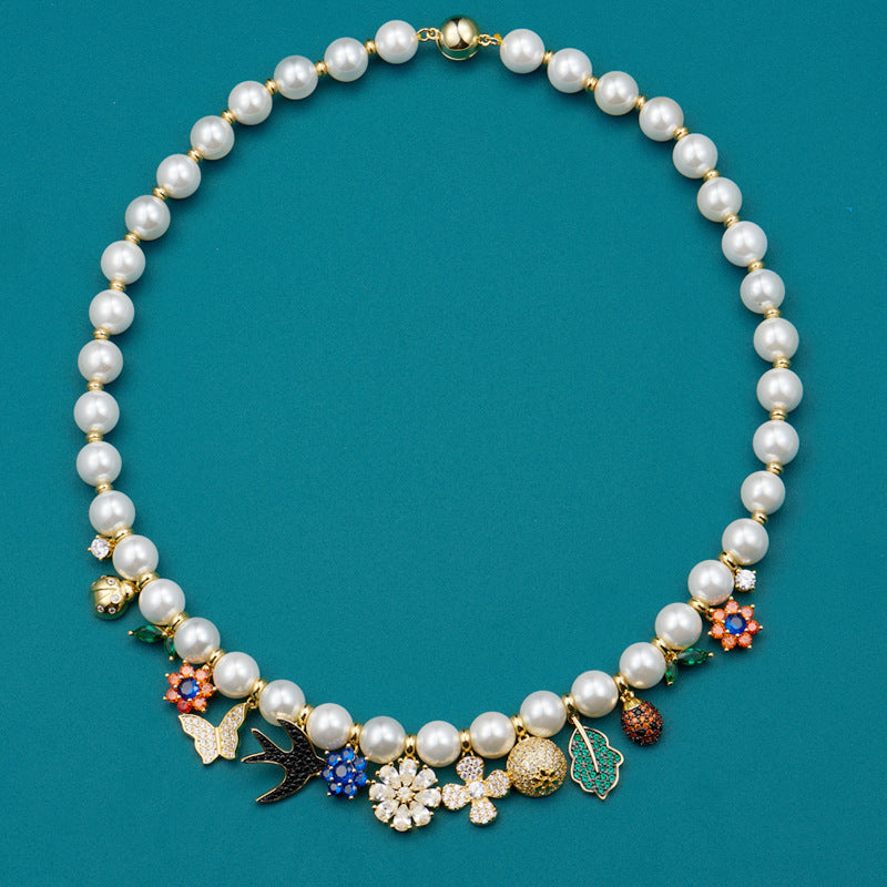 Fashionable retro style jewelry garden necklace women's jewelry flower pendant swallow beetle buckle pearl collarbone chain